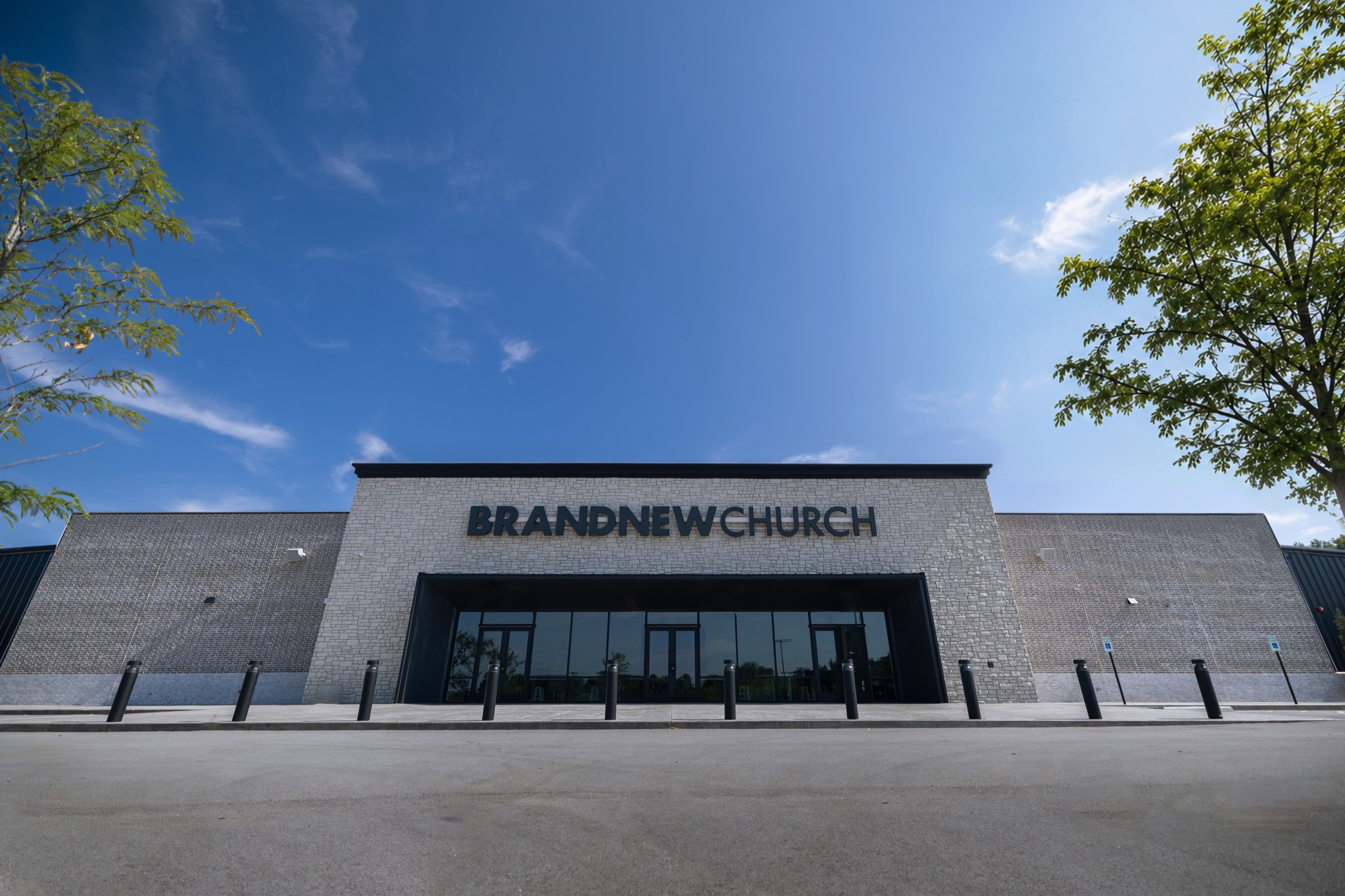 The front of the Brand New Church campus under a wide open sky
